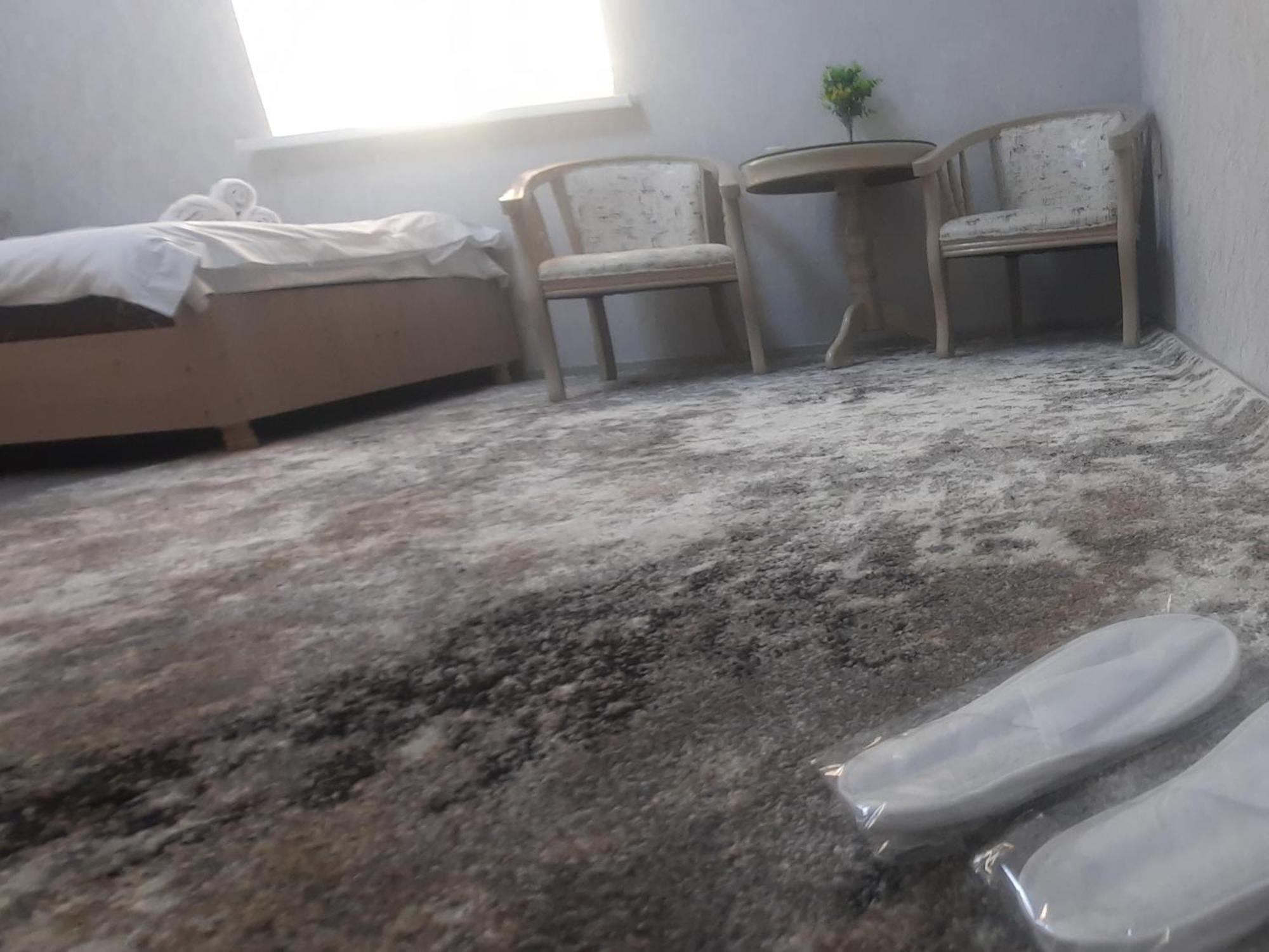 Хотел Хесон Khujand Habitación foto